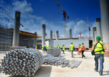 ITAR-TASS: ST PETERSBURG, RUSSIA. JUNE 25, 2012. Workers at the construction site of a new terminal at the Pulkovo International Airport. (Photo ITAR-TASS / Ruslan Shamukov) Россия. Санкт-Петербург. 25 июня. На строительной площадке нового централизованного терминала аэропорта "Пулково". Фото ИТАР-ТАСС/ Руслан Шамуков